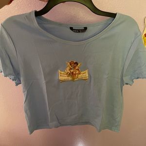cropped baby blue shein shirt with two angels !